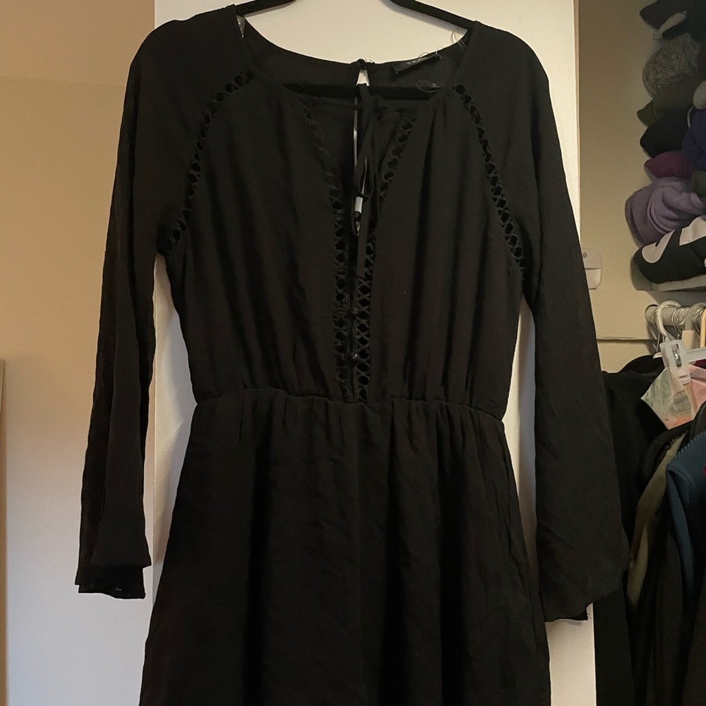 Cute black romper never used size medium